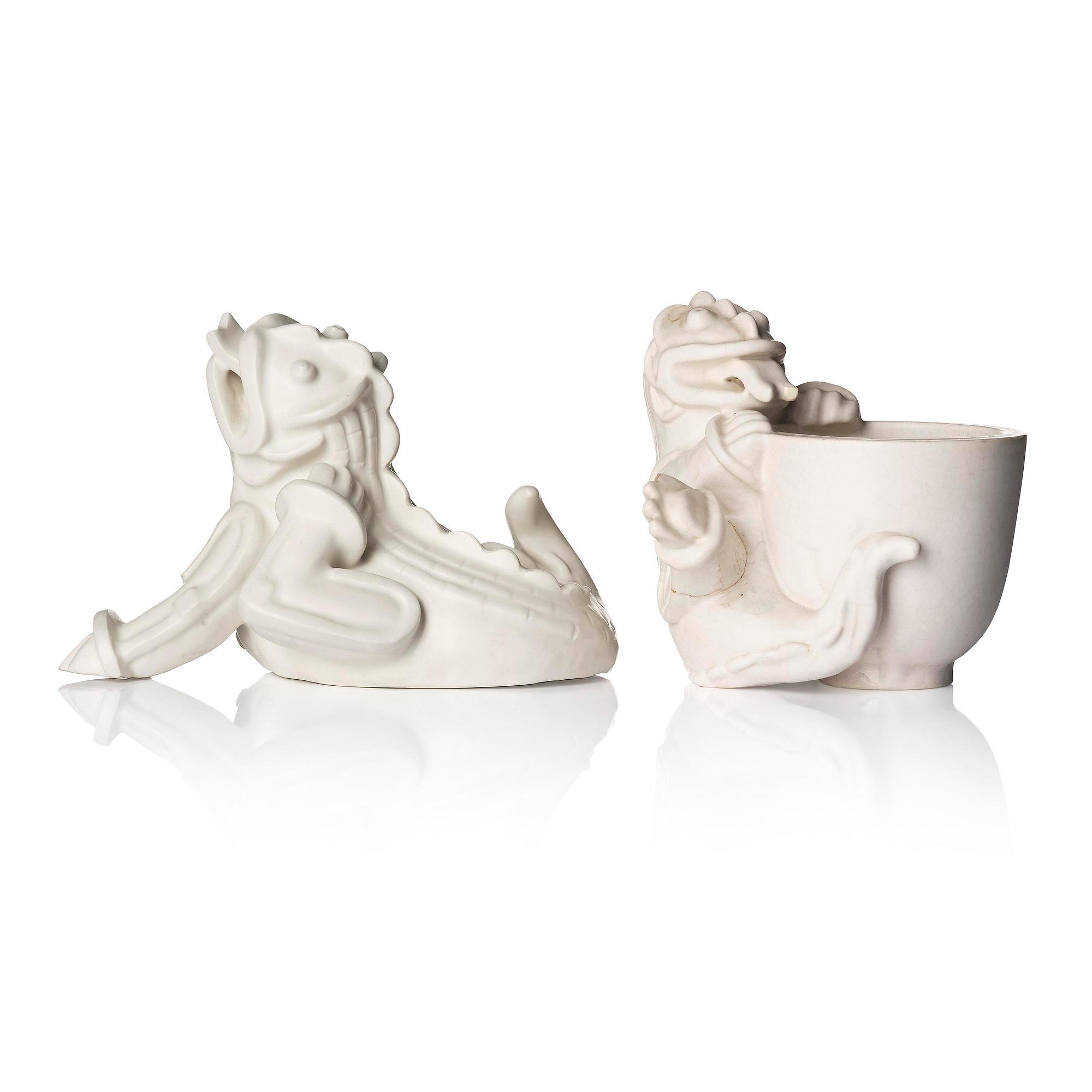 Wilhelm Kåge, a set of two stoneware sculptures of dragon puppies, Gustavsberg, Sweden 1940-50's.