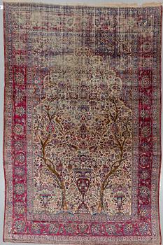 A semi-antique silk Kashan, ca 316 x 205.