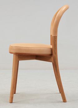 An Erik Gunnar Asplund walnut and beige leather 'Göteborg' chair, by Cassina, Italy.