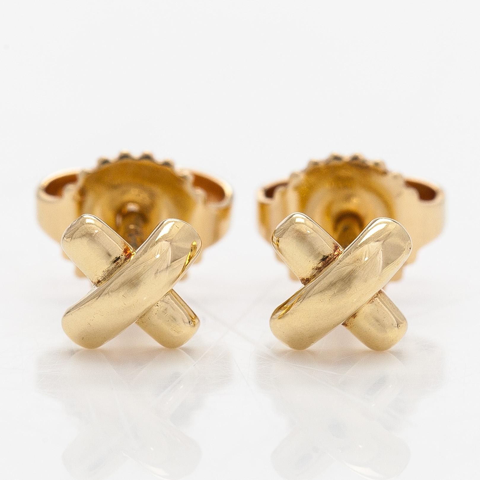 Tiffany & Co, a pair of 18K gold 'Cross Stitch' earrings.