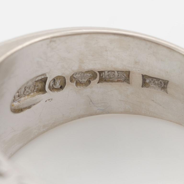 Ring, Hellström & Åhrling. 18K white gold with an emerald and old-cut and brilliant-cut diamonds.