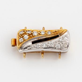 14K gold and brilliant-cut diamond clasp.