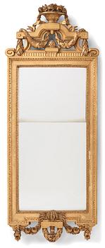100. A Gustavian giltwood mirror by J. Åkerblad (master in Stockholm 1758-99),