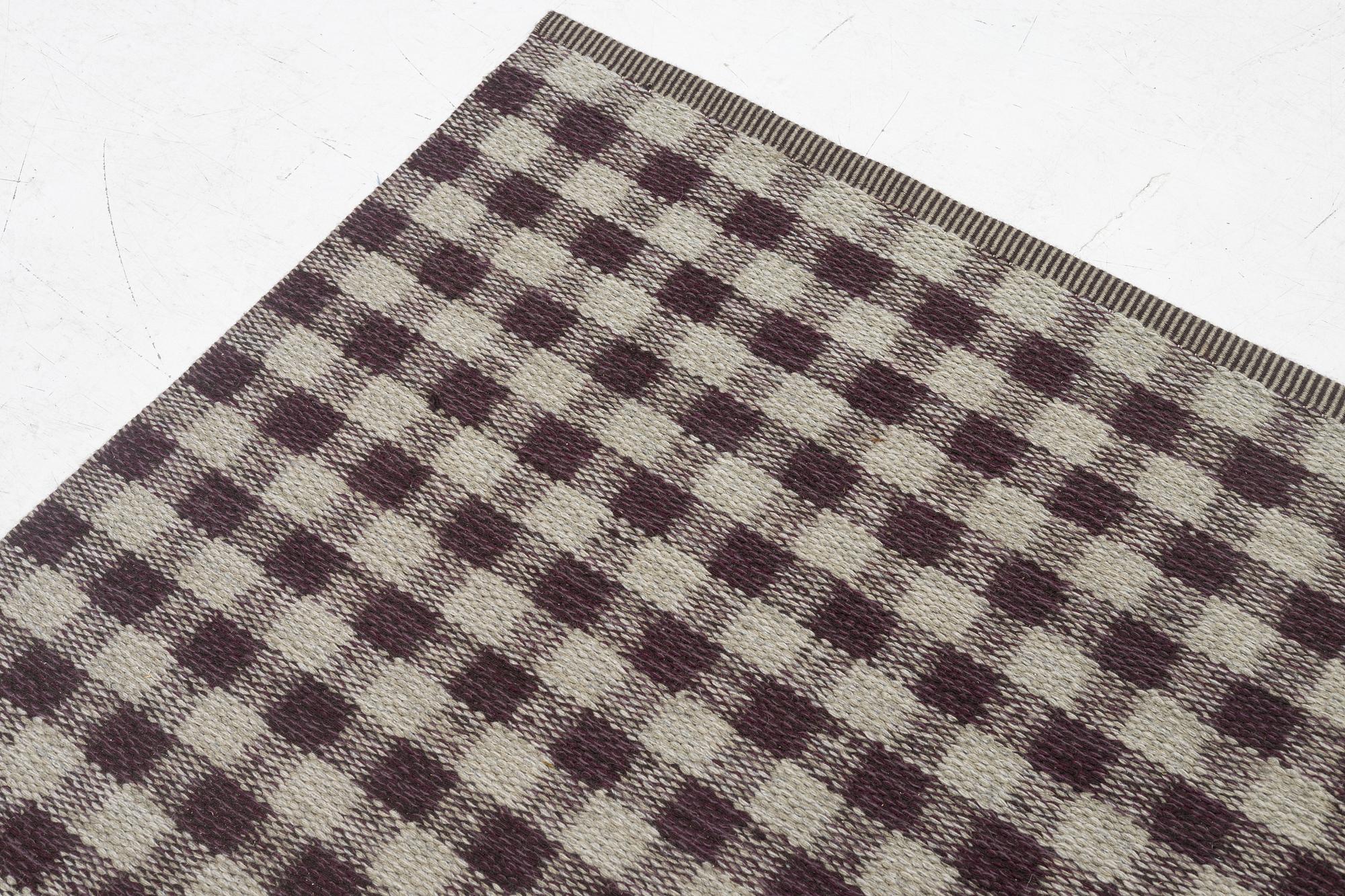 A flat weave "Vichy" carpet from Kasthall, c. 198 x 136 cm.