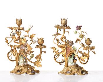 A pair of Meissen Rococo-style three-light candelabra, second half of the 1800's.