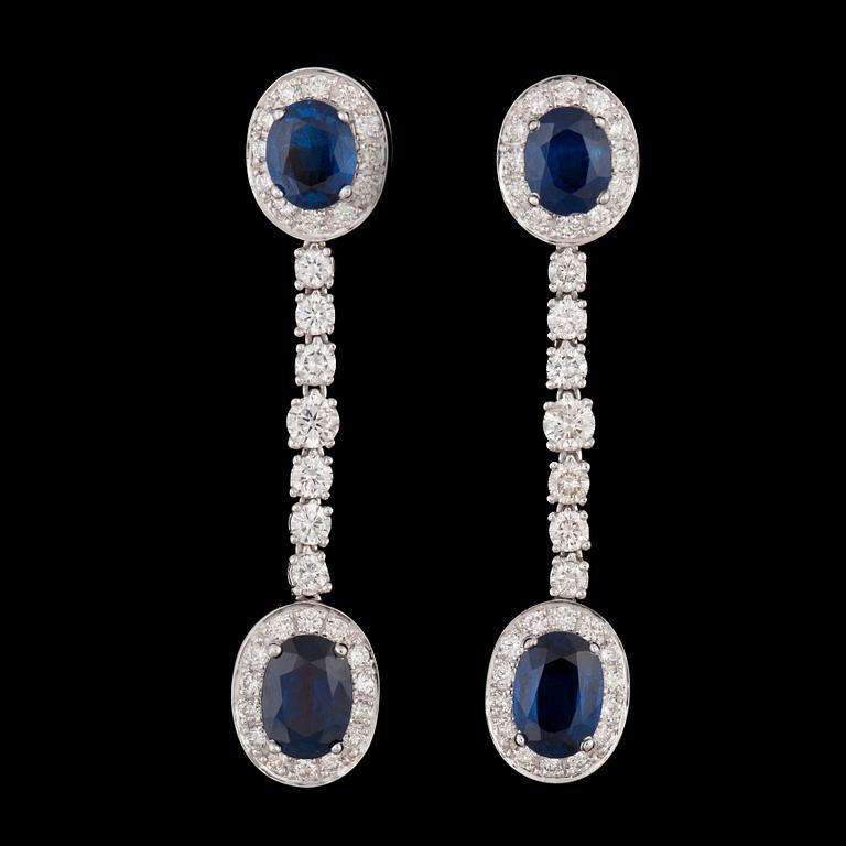 A pair of blue sapphire, tot 3.65 cts and brilliant cut diamond earrings, tot. 1.68 cts.
