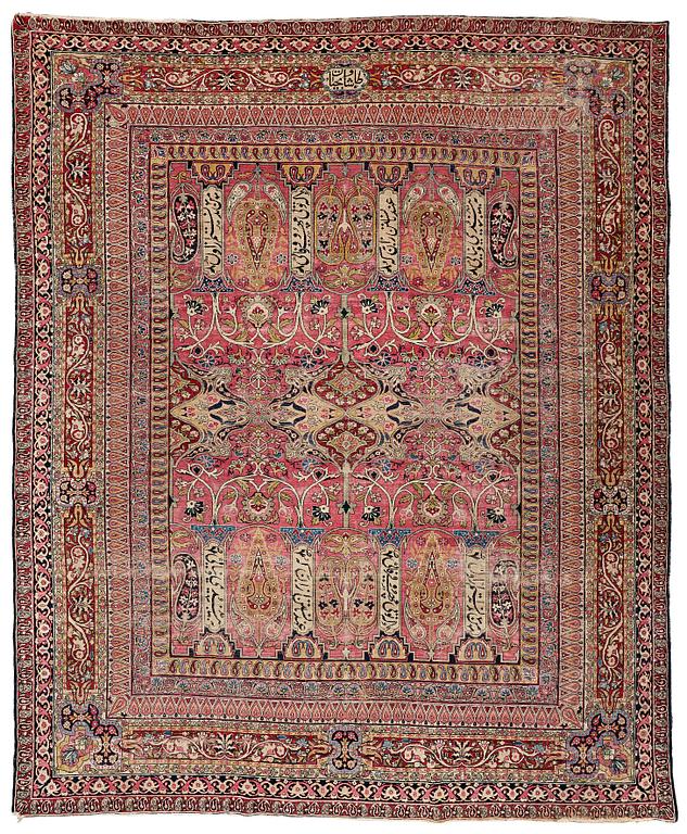 A CARPET, an antique Kerman Laver, ca 363 x 301 cm.