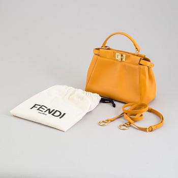 a Fendi 'Peekaboo' bag.