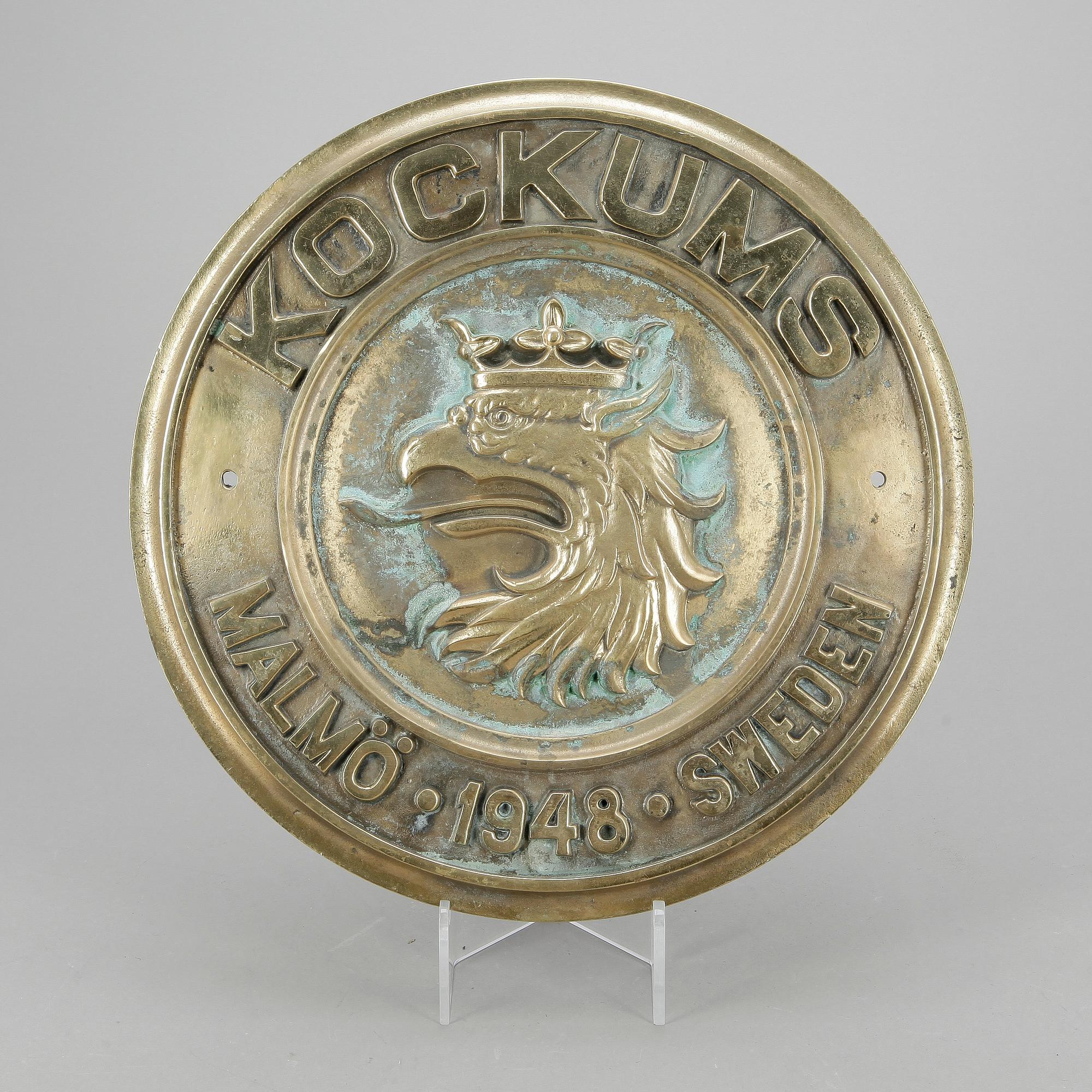 SKYLT, mässing, Kockums, Malmö, 1948.