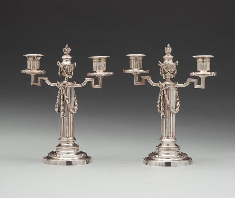 A pair of Fabergé, silver candelabra, workmaster Julius Rappoport, S.t Petersburg before 1899.