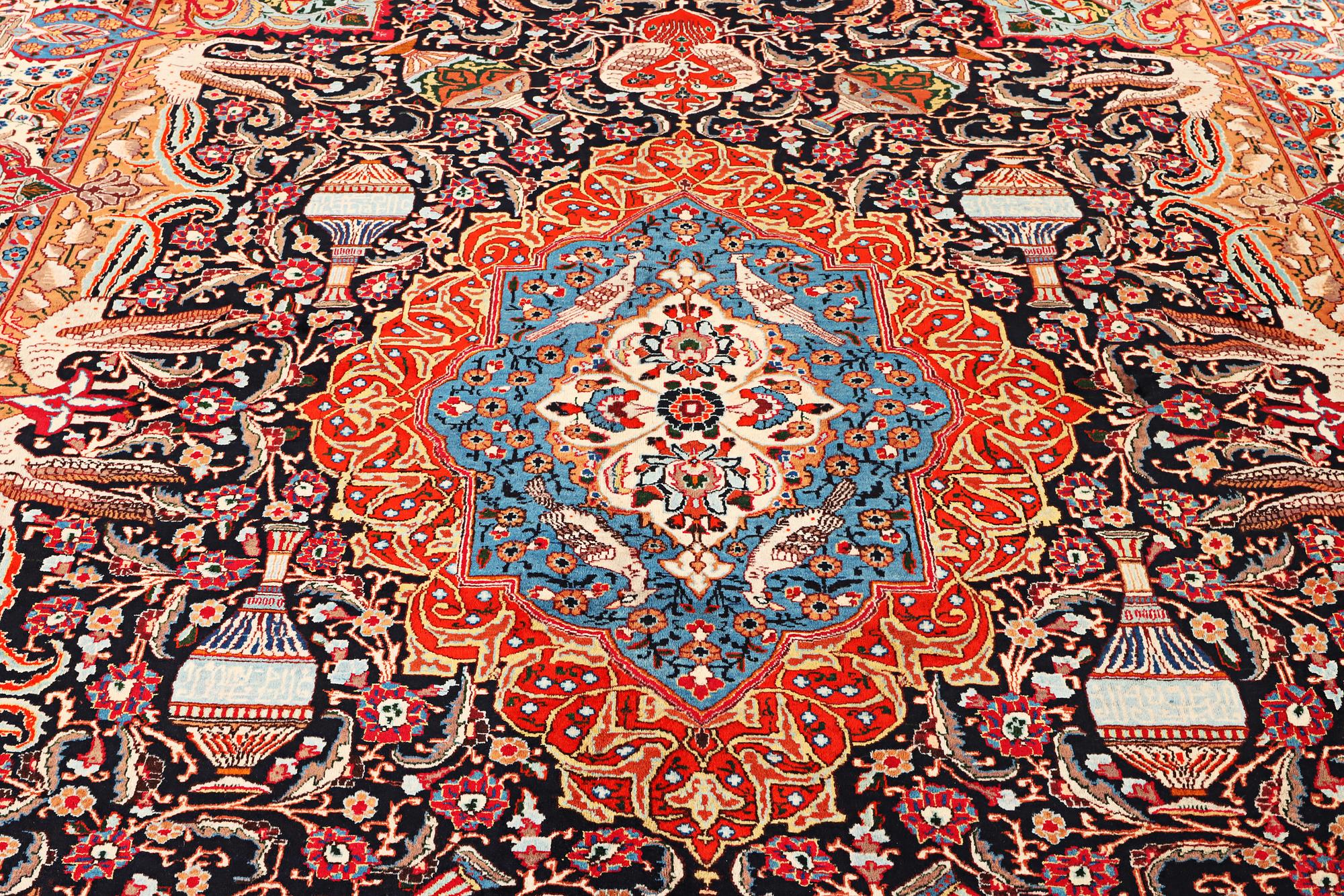 A Kashmar carpet, c. 390 x 305 cm.