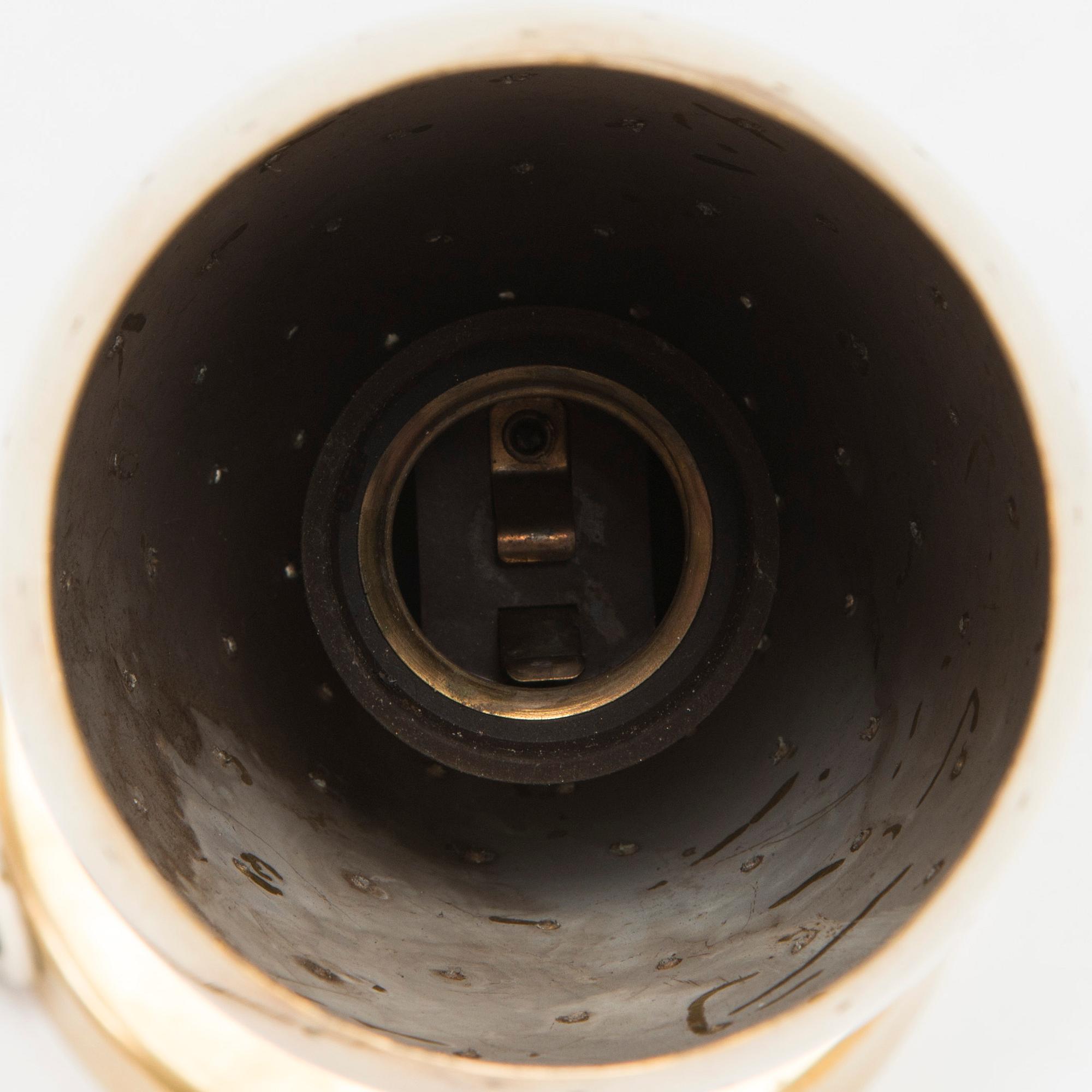 A mid-20th century wall light, Itsu, Finland.