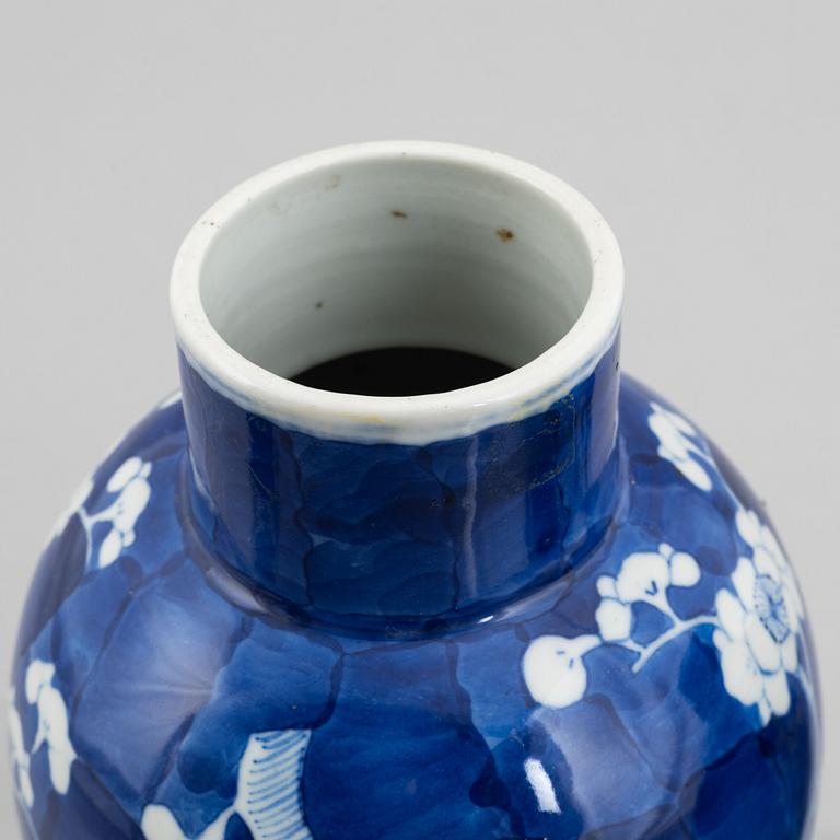 A pair of vases with covers, China, late Qing dynasty.