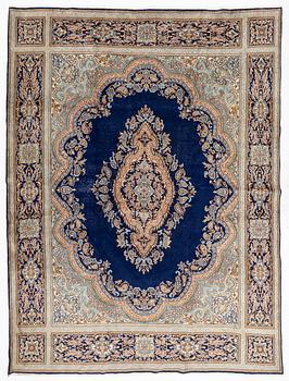 A Kerman carpet, circa 403 x 301 cm.