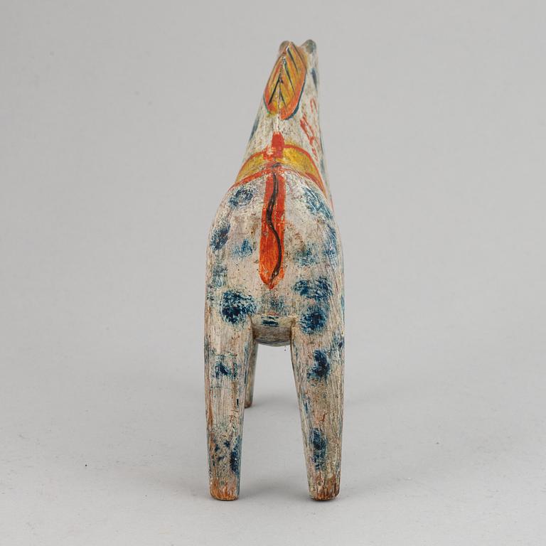 A wooden carved and painted 'Dalahäst', early 20th century.