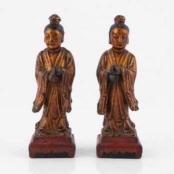 A pair of cold gilt and lacquered wooden joss stick holders, Qing dynasty, 19th Century.