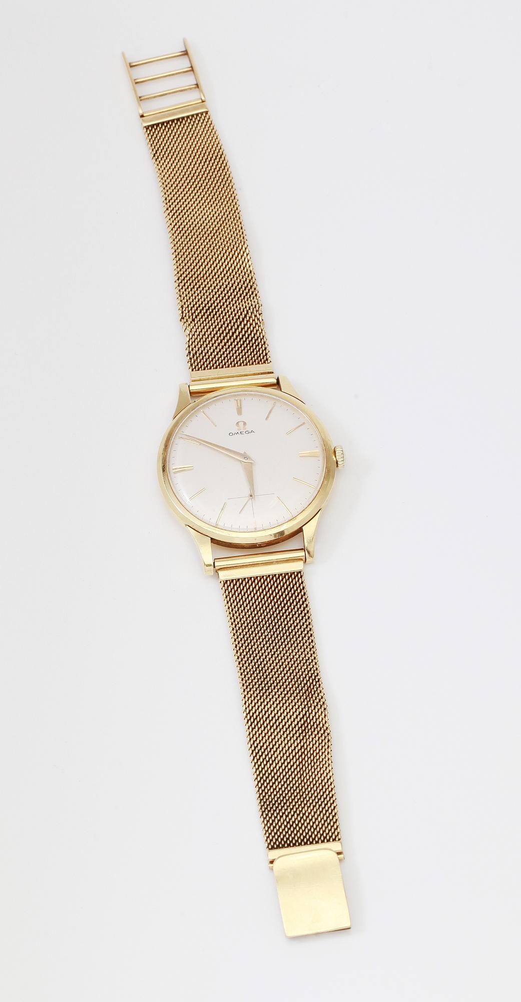 ARMBANDSUR, 18K guld, Omega. Total vikt inklusive urhus ca 65 g.