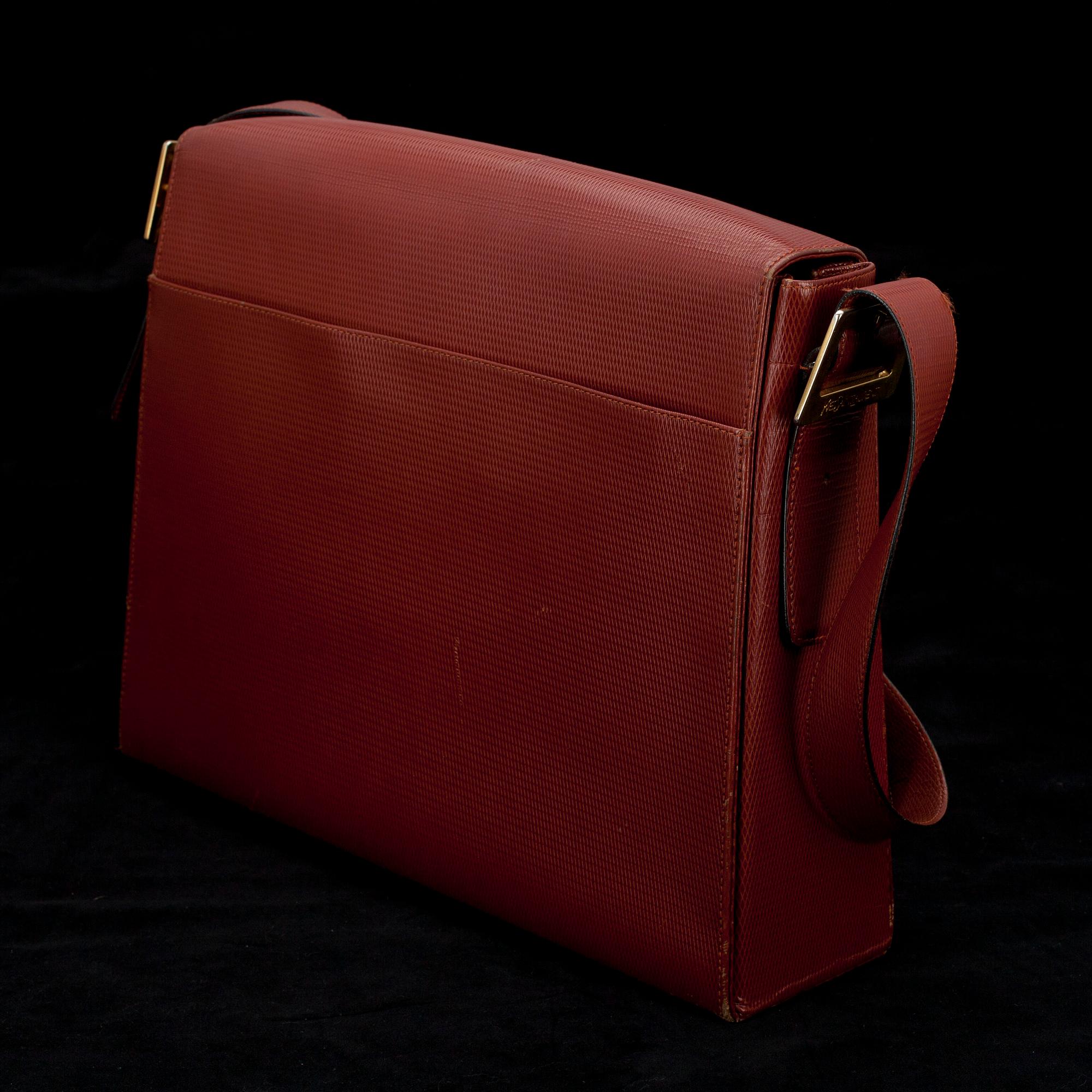 PORTFÖLJ, Yves Saint Laurent.