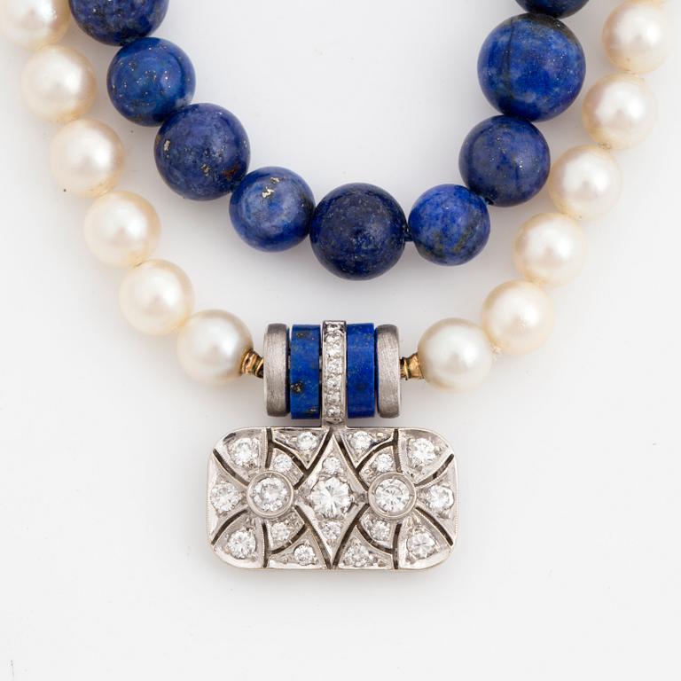 A Gaudy clasp and two necklaces.