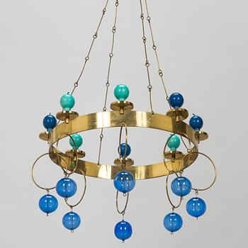 Kaija Aarikka, Ljusmobil, Aarikka med stearinljus av Timo Sarpaneva. 1960-/1970-tal.