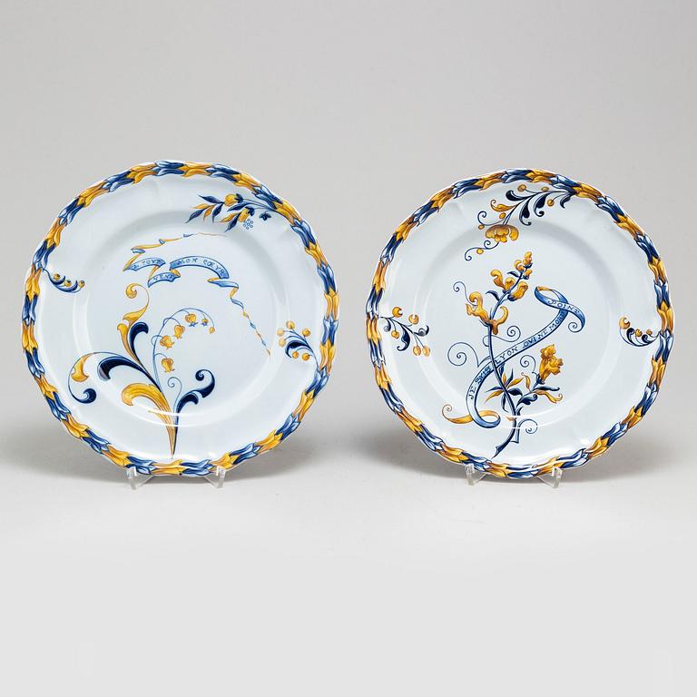 A set of four french faience cabinet plates signed Emile Gallé, Nancy. C. 1900.