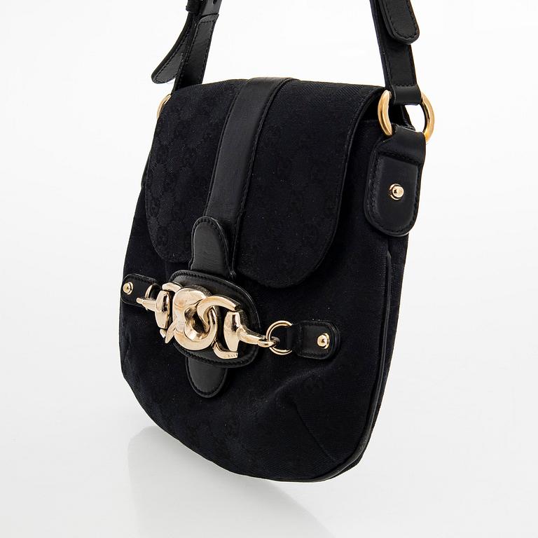 Gucci, a handbag.