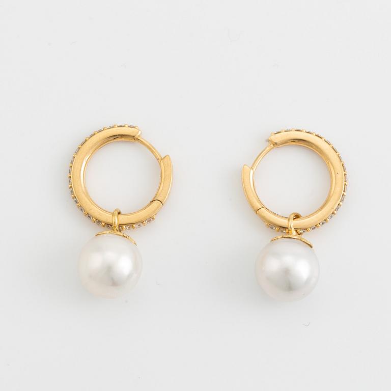 South sea pearl and brilliant cut diamond earrings.