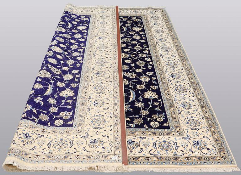 A carpet, Nain part silk, 350 x 250 cm.