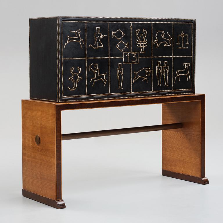Otto Schulz, a Swedish Modern cabinet on stand by Boet, Gothenburg 1930-40's.