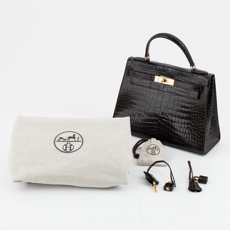 Hermès, A brown Alligator Mississippiensis "Kelly 28", 1964.