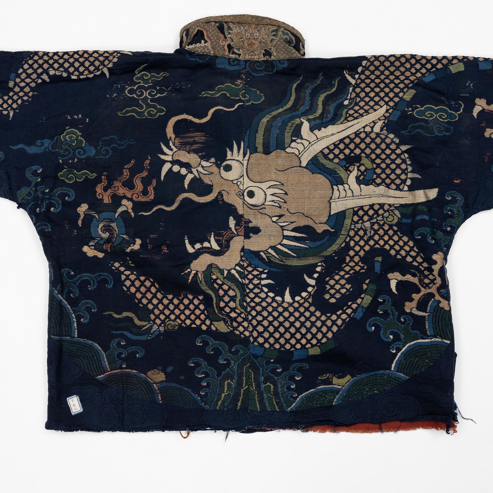A rare fragment of a silk four clawed 'dragon' jacket, late Ming dynasty/early Qing dynasty.