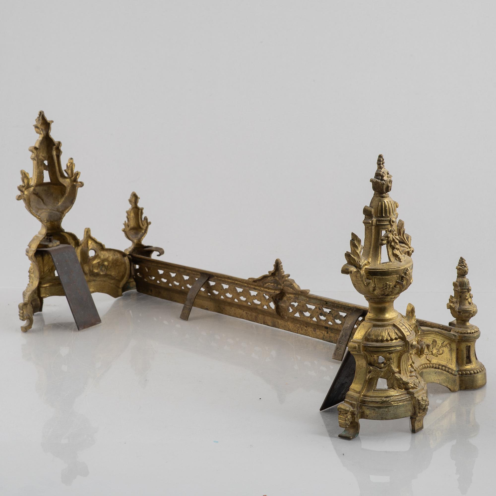 A pair of Louis XVI-style bronze andirons, France, later part of the 19th century.