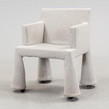 a "V.I.P. chair" by Marcel Wanders for Moooi, deigned in 2000.