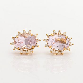 A pair of 14K gold earrings with faceted morganites and brilliant-cut diamonds.