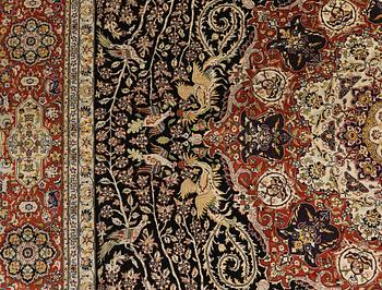 A oriental silk carpet, 303 x 201 cm.