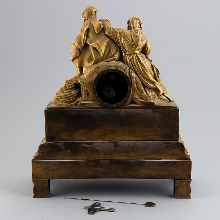 A Fench late Empire pendulum clock, first half of the 19th century.