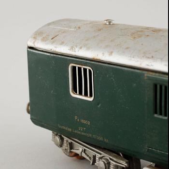 A 1940/50s model train set of 31 pcs in O-scale made by HAG, Switzerland.