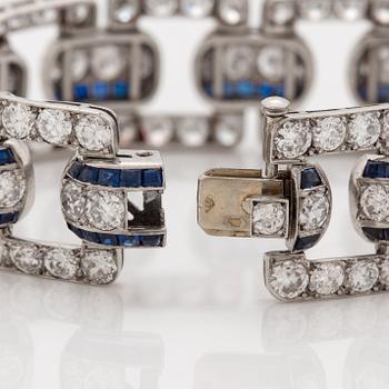 An Art Deco step cut sapphire and  old- cut diamond bracelet.