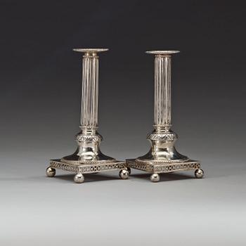 A matched pair of Swedish 18th century silver candlesticks, marks of Johan Wilhelm Zimmerman, Stockholm 1799.