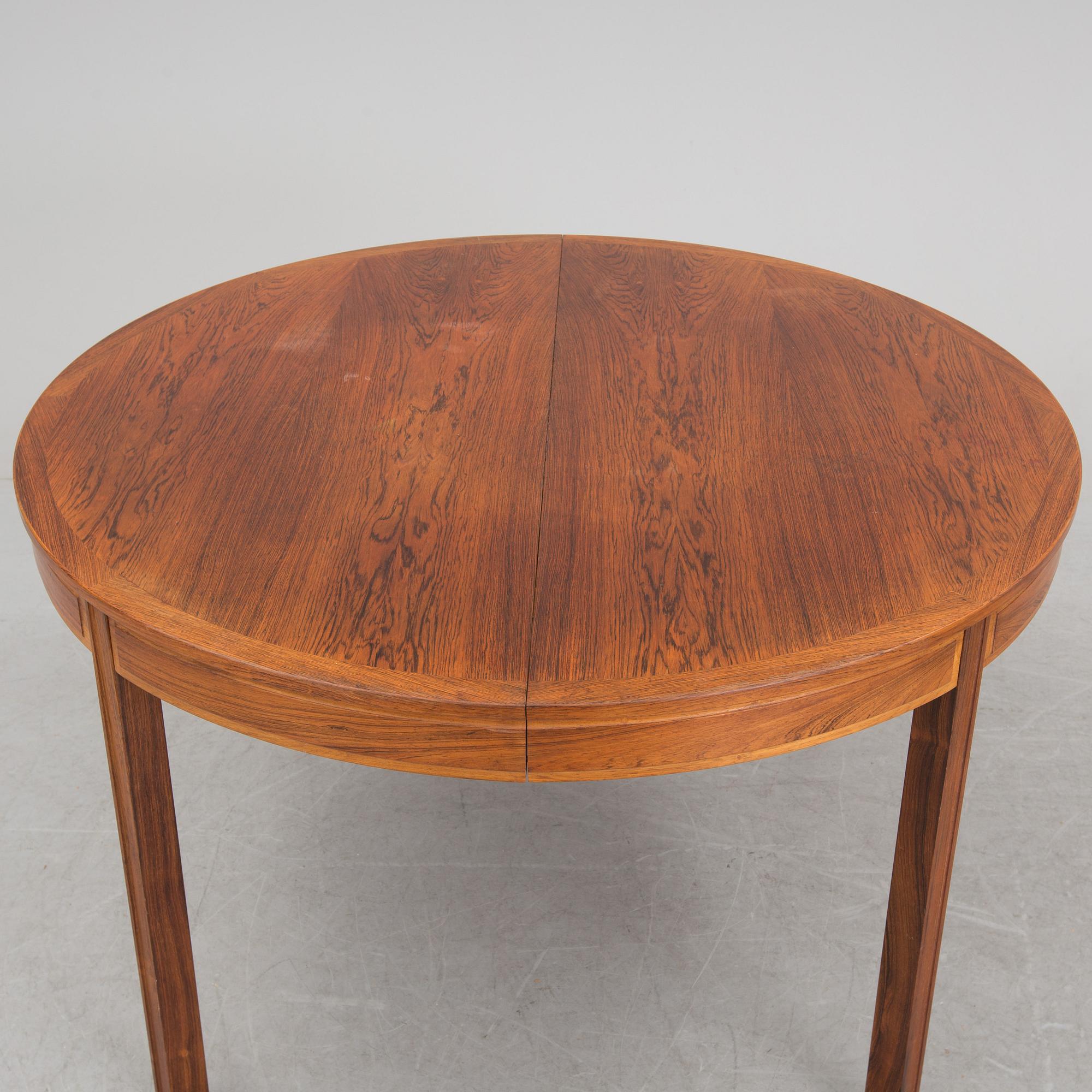 A rosewood dining table by Bertil Fridhagen for Bodafors.