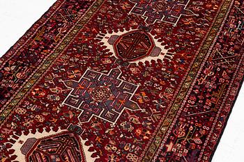 A semi-antique Karadja runner, c. 405 x 155 cm.
