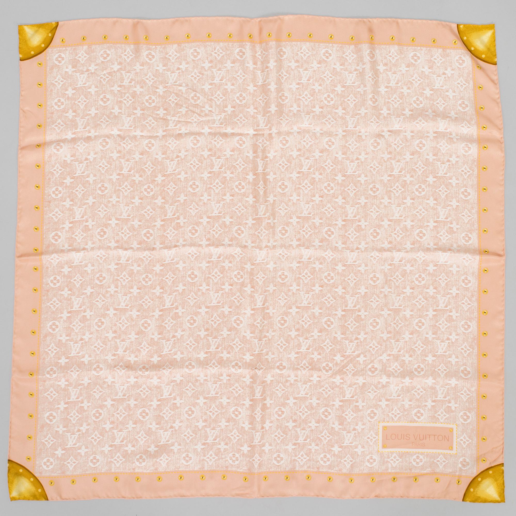 Louis Vuitton, a silk scarf.