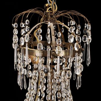 An early 20th century empire style chandeliere.