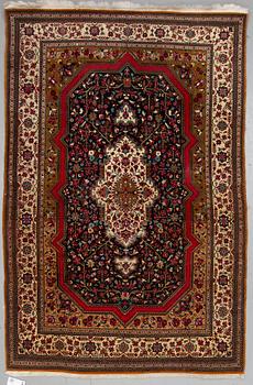 A RUG, Old Qum, ca 216 x 140 cm.