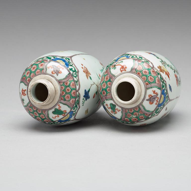 A pair of famille verte vases, presumably Samson, 19th Century.