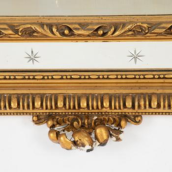 A Baroque style mirror, circa 1900.