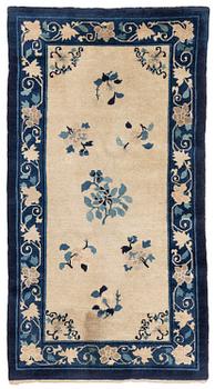 966. An antique/semi-antique Beijing rug, northern China, around 1920, c. 180x95 cm.
