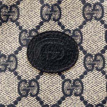 a 1980's Gucci bag and purse.