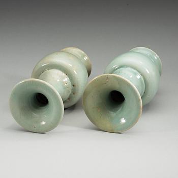 A pair of celadon glazed vases, presumably Yuan/Ming dynasty.