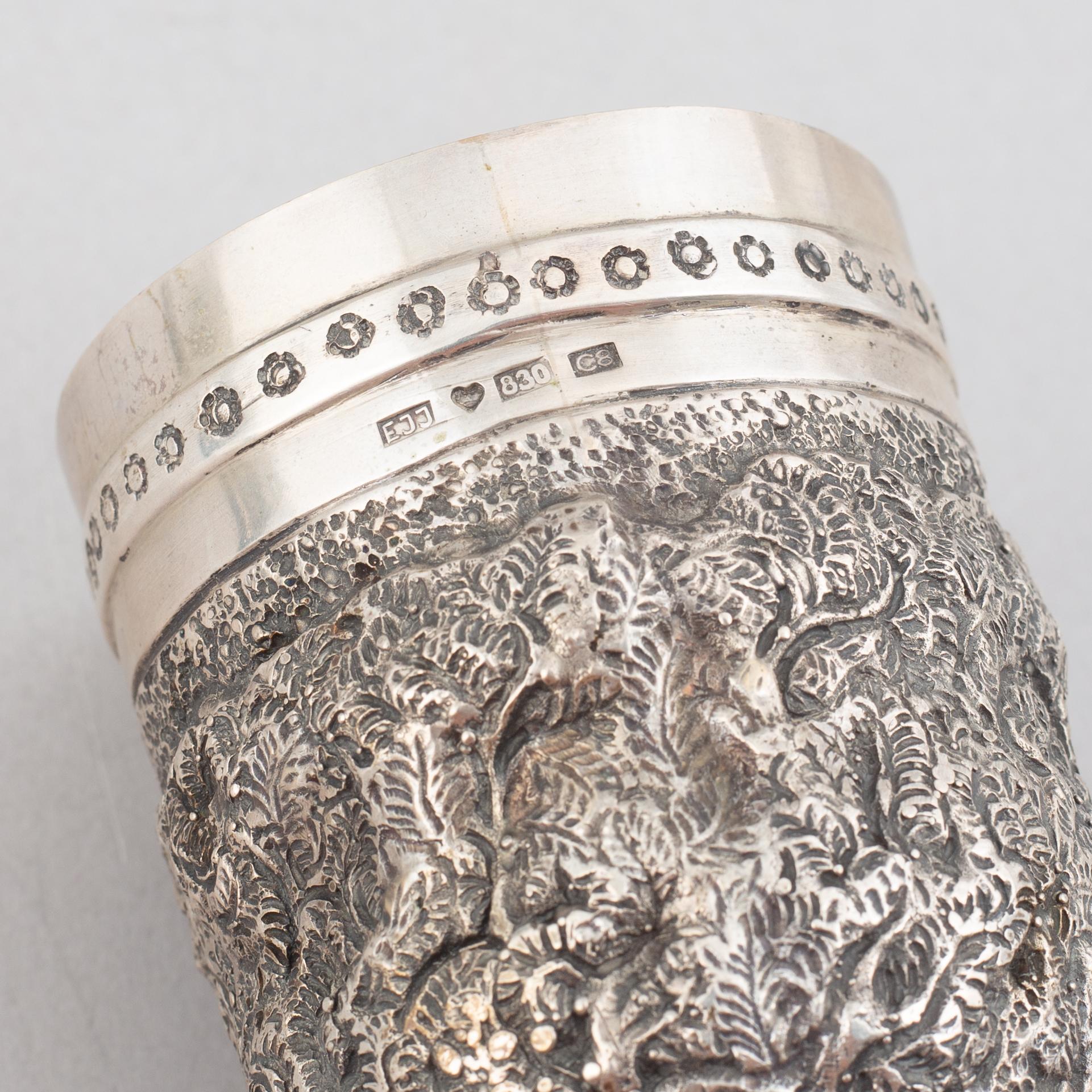 E.Jäntti, four silver cups, a three-piece silver coffee service and a silver tray, Helsinki, Finland,1979-81.